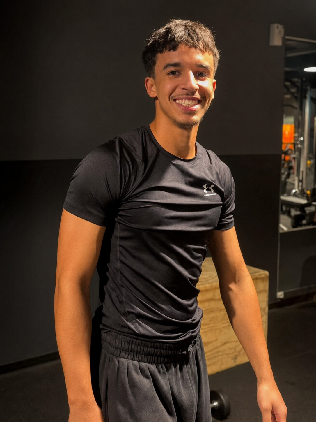 Portrait d'Amir Fehmi en salle de sport